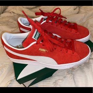 Red suede puma sneakers